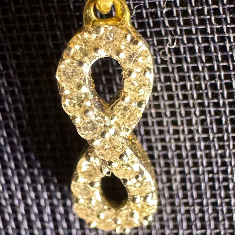 Elegant Gold Infinity Pendant and chain real gold and diamonds
